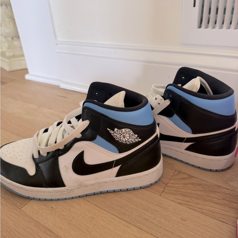 Blue and black Jordans 7 in a half, ready to ship